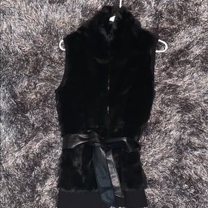 Never worn Black Faux fur vest with belt
